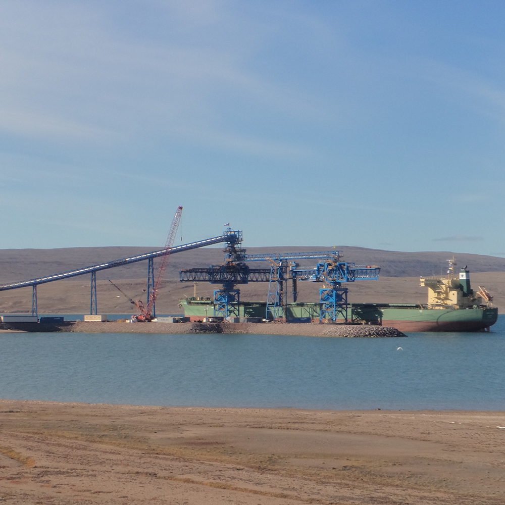 A cargo ship being loaded at Milne Inlet Ore Dock